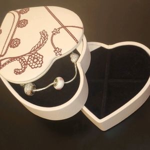 Pandora heart-shaped box and charm bracelet